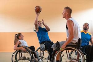 a photo of basketball teams with disabilities with the selector in the big hall before the start of the basketball game