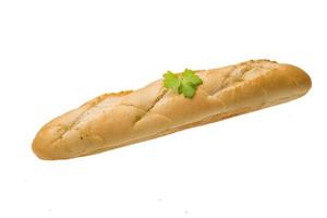 Fresh baguette on white photo
