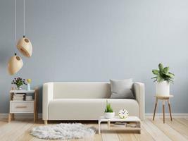 maqueta de pared azul claro en tonos cálidos con sofá color crema y decoración mínima. representación de ilustración 3d