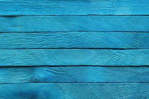 The bright blue wooden background. Colorful background. photo