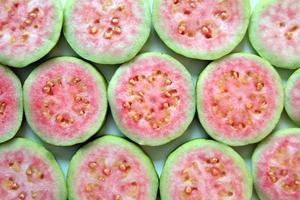 Ripe and fresh guava close up for background. photo