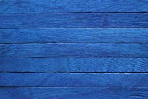 el fondo de madera azul brillante. fondo colorido foto