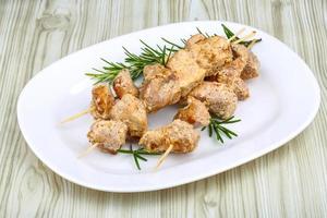 Chicken skewers dish view photo