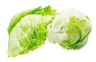 Iceberg salad in a bowl on wooden background photo