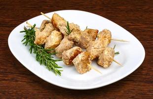 Chicken skewers dish view photo