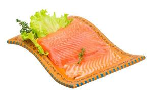 Salmon fillet on the plate and white background photo