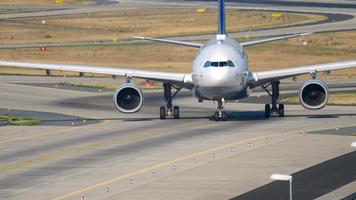 FRANKFURT AM MAIN, GERMANY JULY 19, 2017 - Lufthansa Airbus A330 taxiing after landing on runway 25R. Fraport, Frankfurt, Germany video