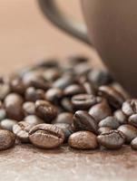 Coffee cup and roasted coffee beans photo