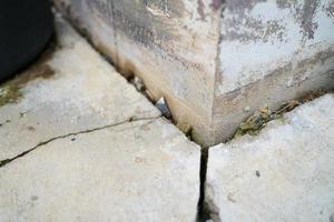 Houses that are not built to the standard, broken beams, cracked walls and house subsidence. photo