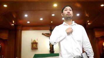 Asian man beard wearing whith shirt christian video