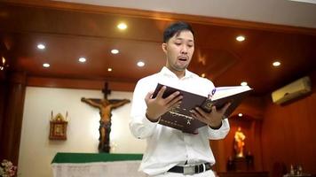 Asian man beard wearing whith shirt christian video