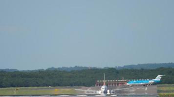 DUSSELDORF, GERMANY JULY 21, 2017 - Boeing 737 Pegasus Airlines acceleration before takeoff at Dusseldorf Airport. In the background, taxiing to the runway of KLM Airlines video