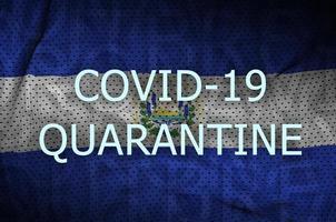 El Salvador flag and Covid-19 quarantine inscription. Coronavirus or 2019-nCov virus