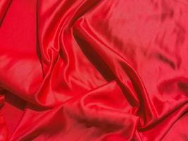 Red fabric texture for backgroundwith coy space. Valentines Day or Christmas Day wallpaper design photo