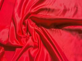 Red fabric texture for backgroundwith coy space. Valentines Day or Christmas Day wallpaper design photo
