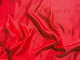 Red fabric texture for backgroundwith coy space. Valentines Day or Christmas Day wallpaper design photo