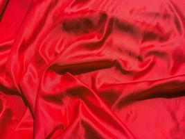 Red fabric texture for backgroundwith coy space. Valentines Day or Christmas Day wallpaper design photo