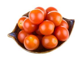 Cherry tomatoes on white photo