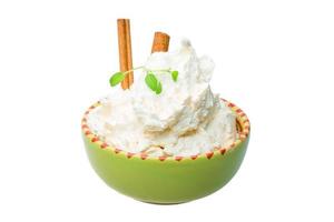 Cottage cheese in a bowl on white background photo