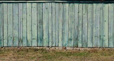 The texture of weathered wooden wall photo