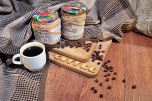 Coffee cup and a text, composed of crackers photo