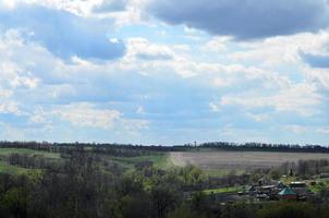 Panorama of the rural landscape in the early summer photo