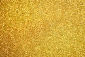 Abstract gold glitter sparkle texture background photo