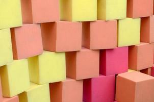 Wall of paralon soft cubes in dry pool, trampoline in the childrens center photo