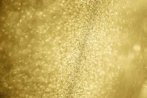 Abstract gold glitter sparkle texture background photo