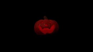 Halloween jack-o-lantern with light changing in dark background. video