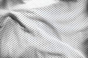Close up of white polyester nylon sportswear shorts to created a textured background photo