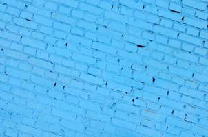 Square brick block wall background and texture. Painted in blue photo