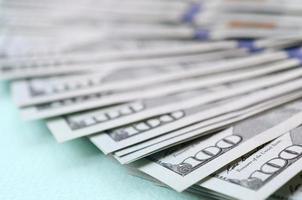 Macro shot with shallow depth of field. Hundred US dollar bills photo