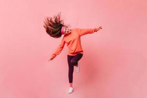Young running woman in fitness outfit hi-res stock photography and