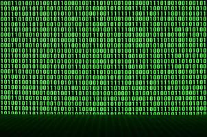 An image of a binary code made up of a set of green digits on a black background photo