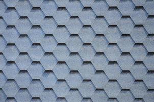 Modern roofing and decoration of chimneys. Flexible bitumen or slate shingles photo