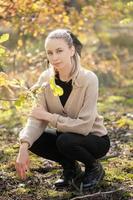 Young woman in forest photo