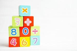 Number wood block cubes for learning Mathematic, education math concept. photo