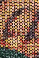 Texture, background made of small stumps painted in different colors, looks like mosaic photo