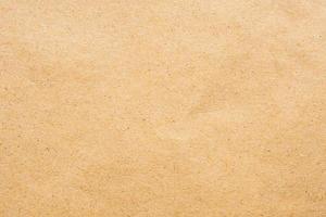 Brown eco recycled kraft paper sheet texture cardboard background photo