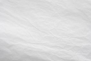 White crumpled paper abstract background texture photo