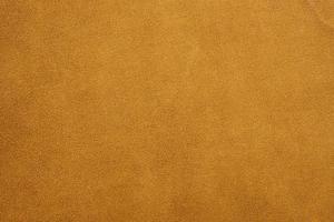 Fondo de patrón de textura de cuero marrón natural abstracto foto