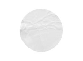 Blank white round paper sticker label isolated on white background with clipping path photo