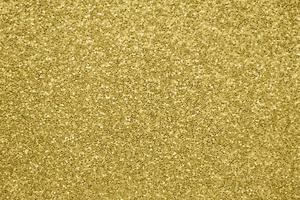 Abstract gold glitter sparkle background photo