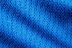 Ropa deportiva azul tela camiseta de fútbol jersey textura cerrar foto