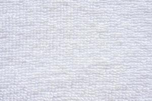 Closeup white cotton towel texture abstract background photo