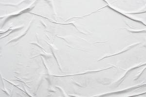 fondo de textura de cartel de papel arrugado y arrugado blanco en blanco foto