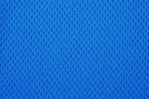 Ropa deportiva azul tela camiseta de fútbol jersey textura cerrar foto