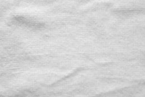 Closeup white cotton towel texture abstract background photo