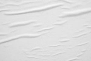 Blank white crumpled and creased paper poster texture background photo